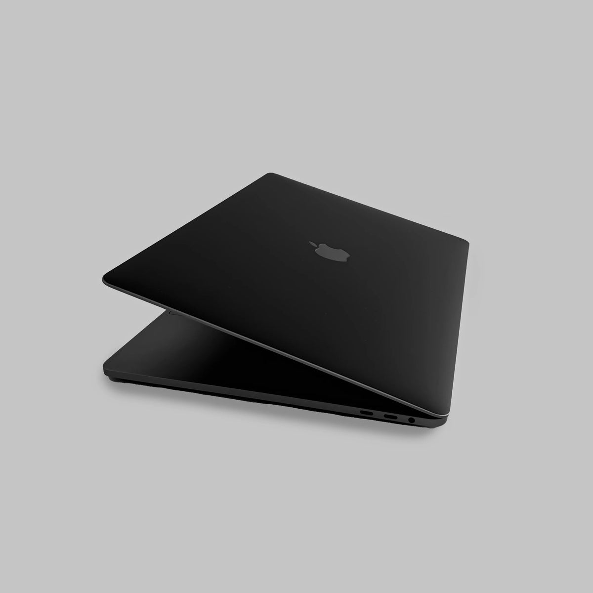 black-macbook-skin-manzer-black